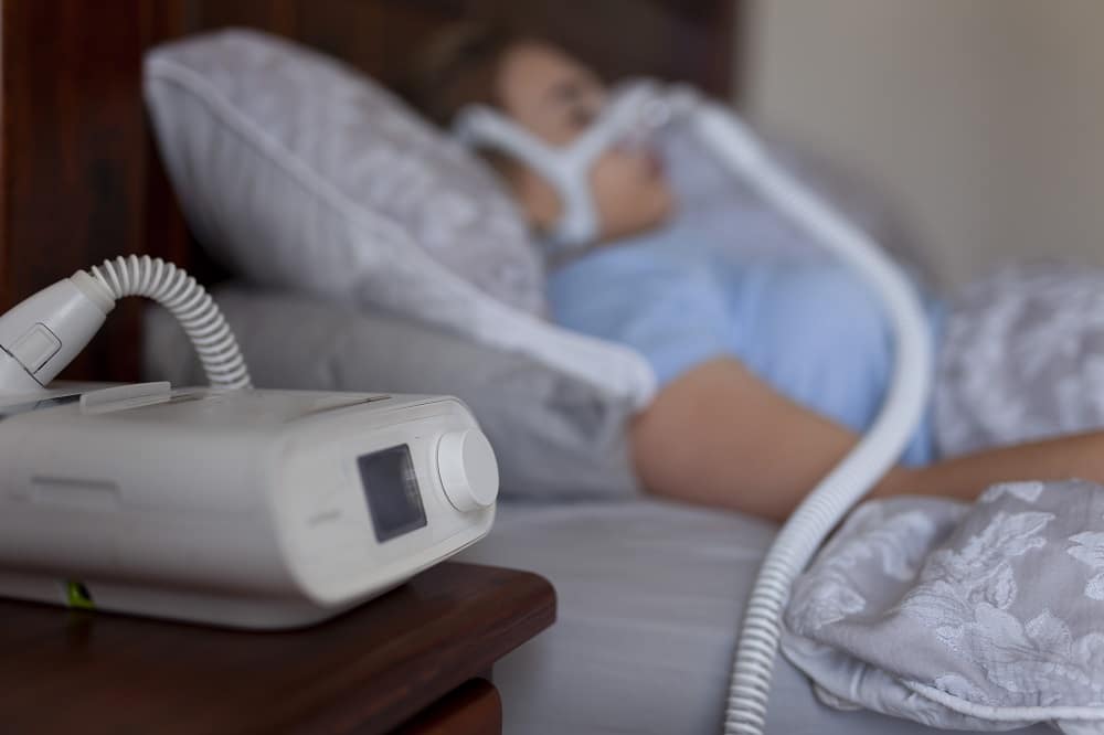 Sleeping with cpap machine and copy space