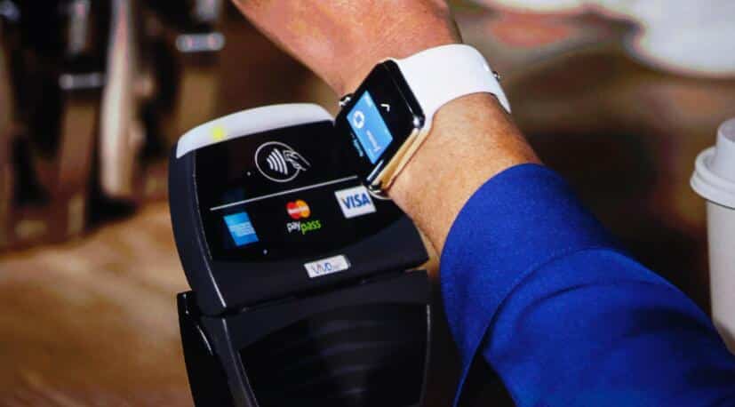 Apple watch close to the NFC card reader system